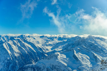 Naklejka premium ski Snowy and rocky peaks of the Austrian Alps