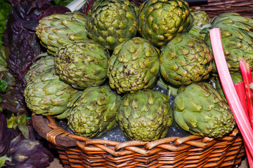 Green and red artichoke.Local produce for sale