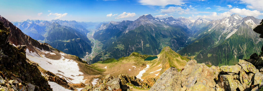 Dramatic panoramic view of the swiss alps as seen from Bristen mountain at Canton Uri in Switzerland