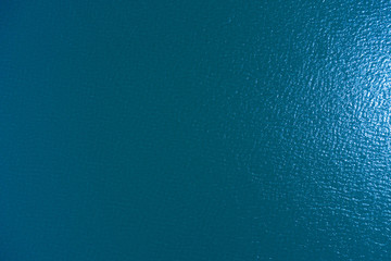 blue water background, corrugated surface
