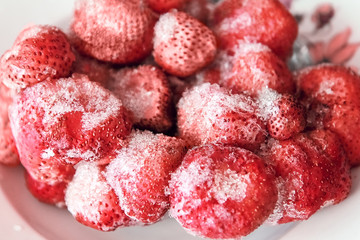 Juicy appetizing strawberries. Thawed strawberries. Tasty dessert, table decoration.