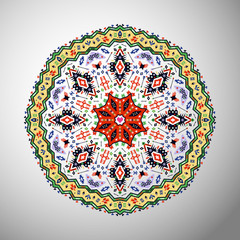 Ornamental round colorful geometric pattern in aztec style