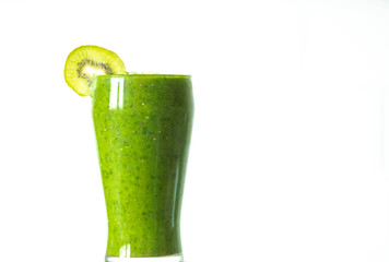 Glass of kiwi spinach smoothie isolated on white background. Healthy lifestyle concept, vegeterian , vegan