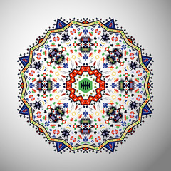 Ornamental round colorful geometric pattern in aztec style