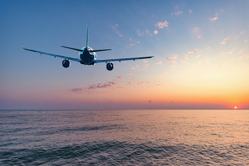 Flight of the plane above the ocean before landing.