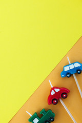  Multi-colored candle cars with space for text. The concept of children's holiday, International Children's Day. 