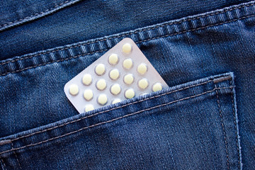 Pills in pocket. Close up. Healthy lifestyle concept.