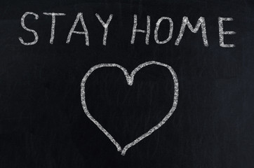 Stay at Home. Stay at Home chalkboard inscription.