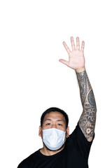 Asian men is wear a medical mask and showing a hand with open hand in white background with copy space above.The concept of protest, attention, request. Place for text or copy space. Clipping path.