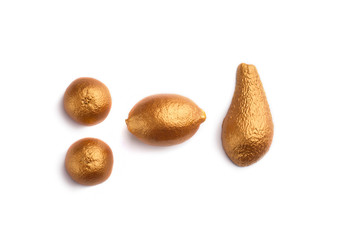 Halves of orange, lemon and avocado on white background