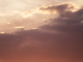 Beautiful clouds at sunset. Background with a beautiful sky.