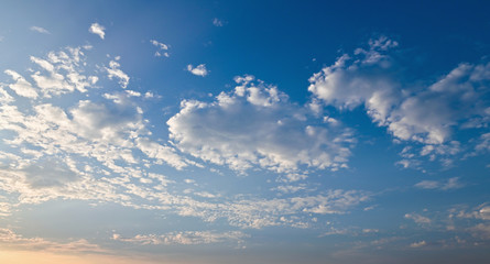 Naklejka na ściany i meble bueatiful blue sky with white cloud and sunset