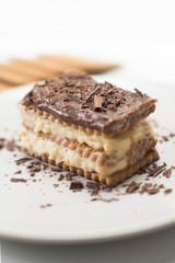 Fototapeta na wymiar Delicious chocolate and cream biscuit cake