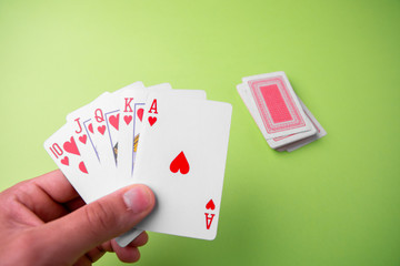 Cards draw from tens to ace. Royal flush. From above. Text space