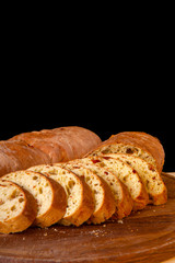sliced sliced fresh bread on a wooden board