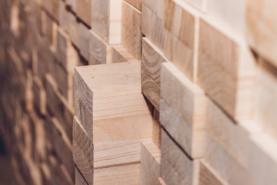 Blocks of wood neatly arranged on a pile