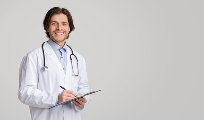 Health Insurance. Portrait Of Friendly Doctor With Medical Chart In Hands