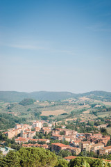 Fototapeta na wymiar Top view of the surrounding landscape from the town of San Gimignano, a world heritage site
