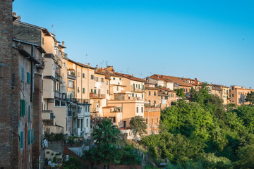 Fototapeta na wymiar Symmetrical view of houses in the village of San Miniato