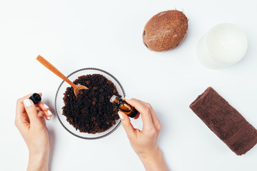 View from above young woman hands preparing natural cosmetic body scrub