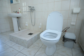 Toilet of maternity department: seat, bowl, lavatory, washbasin, paper box