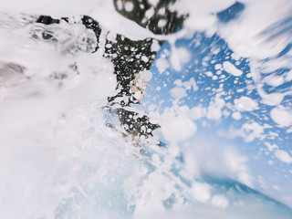 Sea wave hits a rock.