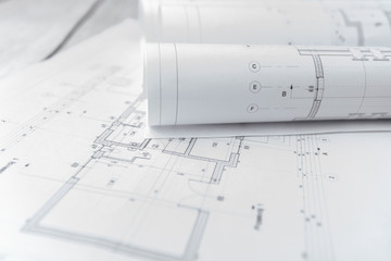 Architect rolls and architectural plan,technical project drawing
