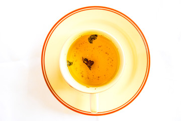 Top view of green tea served with tea cup