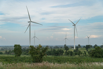 Windmill for renewable electric energy production at huai bong, dan khun thot district, nakhon ratchasima, thailand against cloudy blue sky background