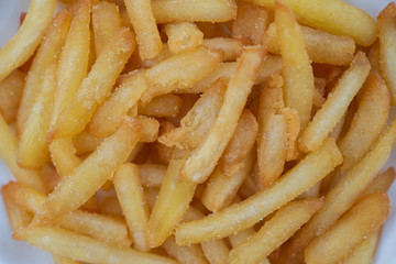 Close up french fries textured background.