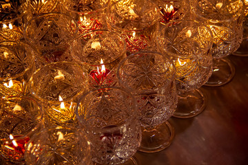 Fototapeta na wymiar Candle lights in glass