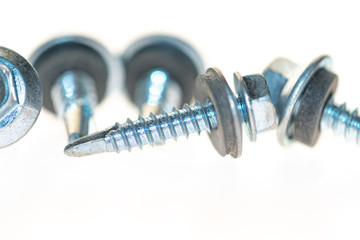 sheet metal and stainless steel screws together with hex nuts