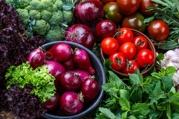 Market. Healthy vegan food. Various fresh vegetables and herbs in wooden bowls. Top view.