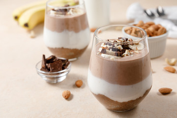 Chia seeds pudding with chocolate and banana smoothie in a glass