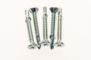 sheet metal and stainless steel screws together with hex nuts