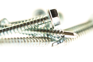 sheet metal and stainless steel screws together with hex nuts