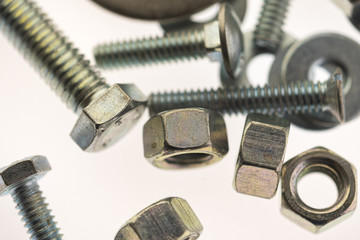 sheet metal and stainless steel screws together with hex nuts