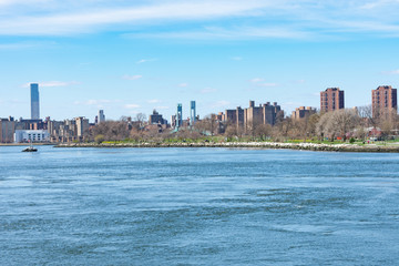 Waterfront of Randalls and Wards Islands during Spring along the East River in New York City