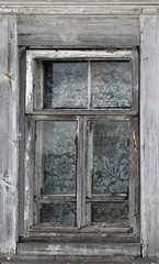 Old wooden window. Vintage frame texture with peeling paint.