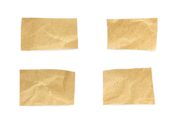 Recycled paper craft stick on a white background. Brown paper torn or ripped pieces of paper isolated on white background.	