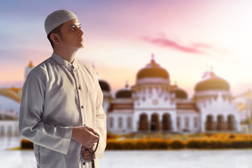 Portrait of young arab man at Baiturrahman Grand Mosque, Banda Aceh, Indonesia