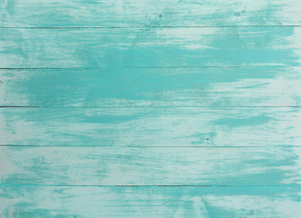 Fototapeta na wymiar Turquoise bright colored vintage wood boards. Grunge wooden background.