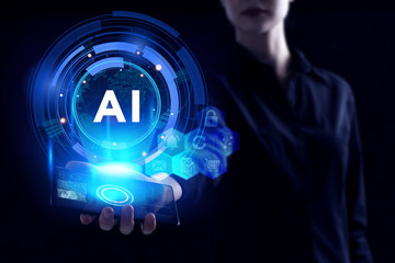 Business, Technology, Internet and network concept. Young businessman working on a virtual screen of the future and sees the inscription: AI