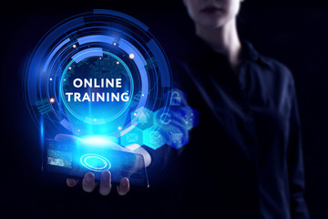 Business, Technology, Internet and network concept. Young businessman working on a virtual screen of the future and sees the inscription: Online training