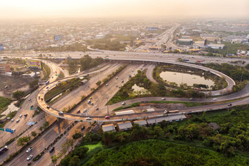 Fototapeta na wymiar Bangkok,Thailand-February 09,2020 : aerial view of highway at sunrise with PM2.5 in the air.