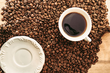 cup of coffee with beans