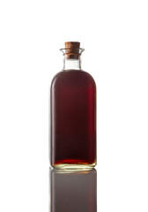 Classic bottle of red vermouth on white background. Isolated image. Vertical image.