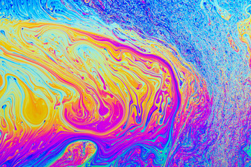 Psychedelic abstract formed by light interference on the surface of a soap bubble