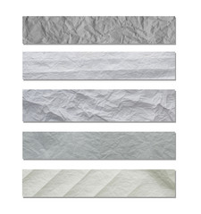 white and gray wide crumpled paper texture background. crush paper so that it becomes creased and wrinkled.
