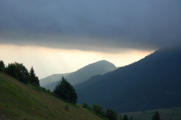 Clouds and sunlight in the morning mountains